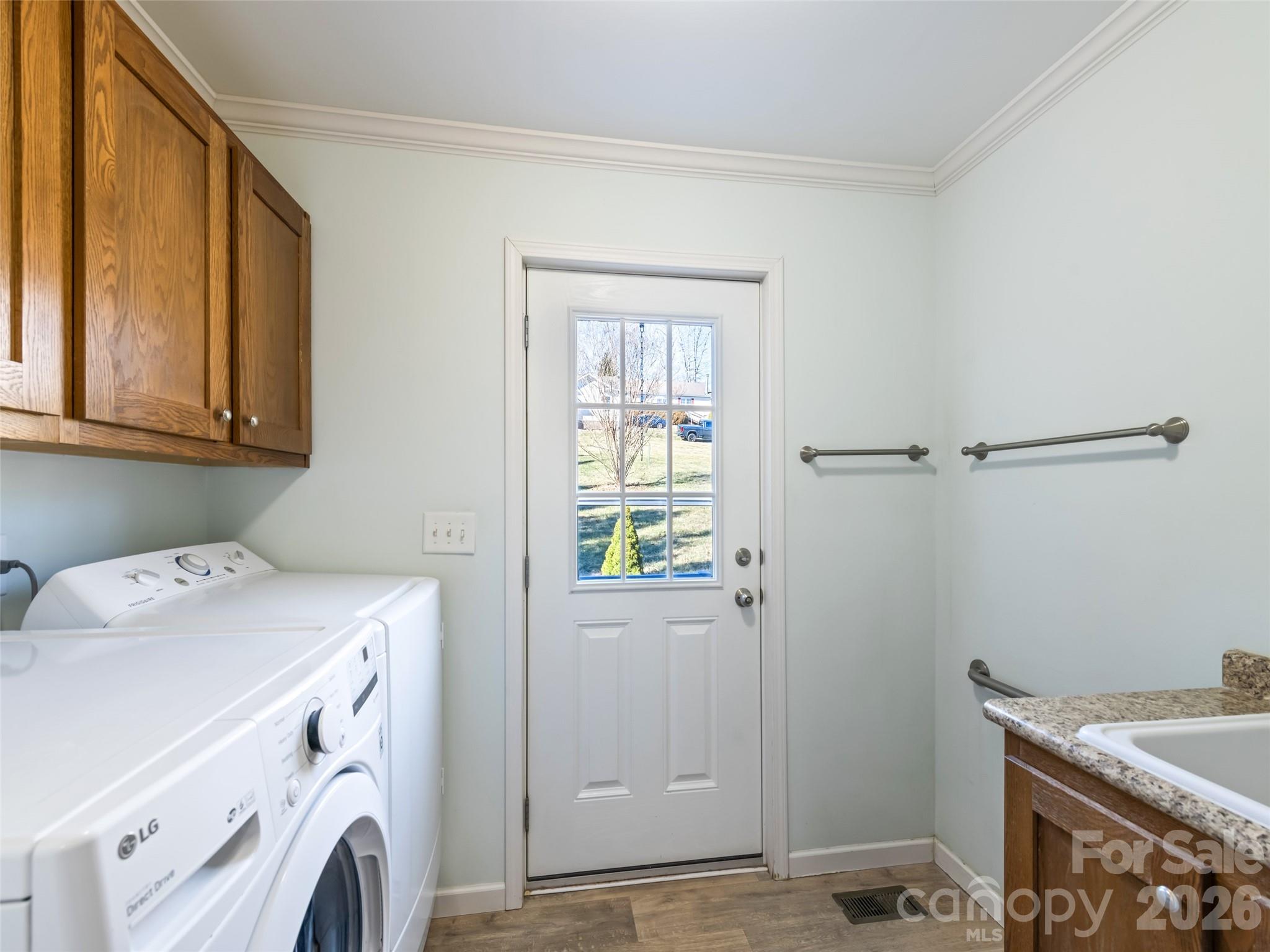 10 Enochs Way Fletcher, NC 28732 - Photo 20 of 24 a utility room with dryer and washer