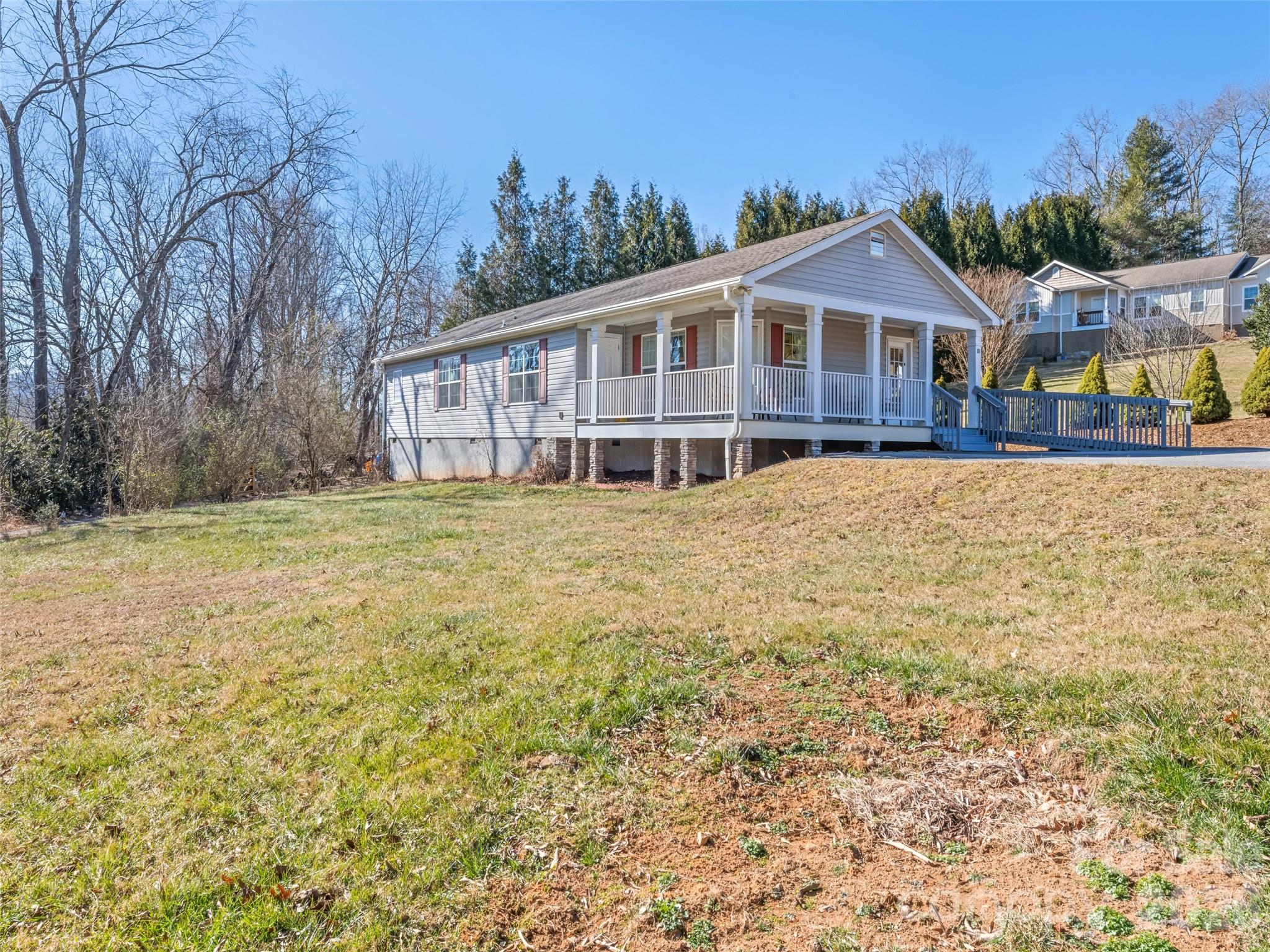10 Enochs Way Fletcher, NC 28732 - Photo 22 of 24 a view of a house with a yard