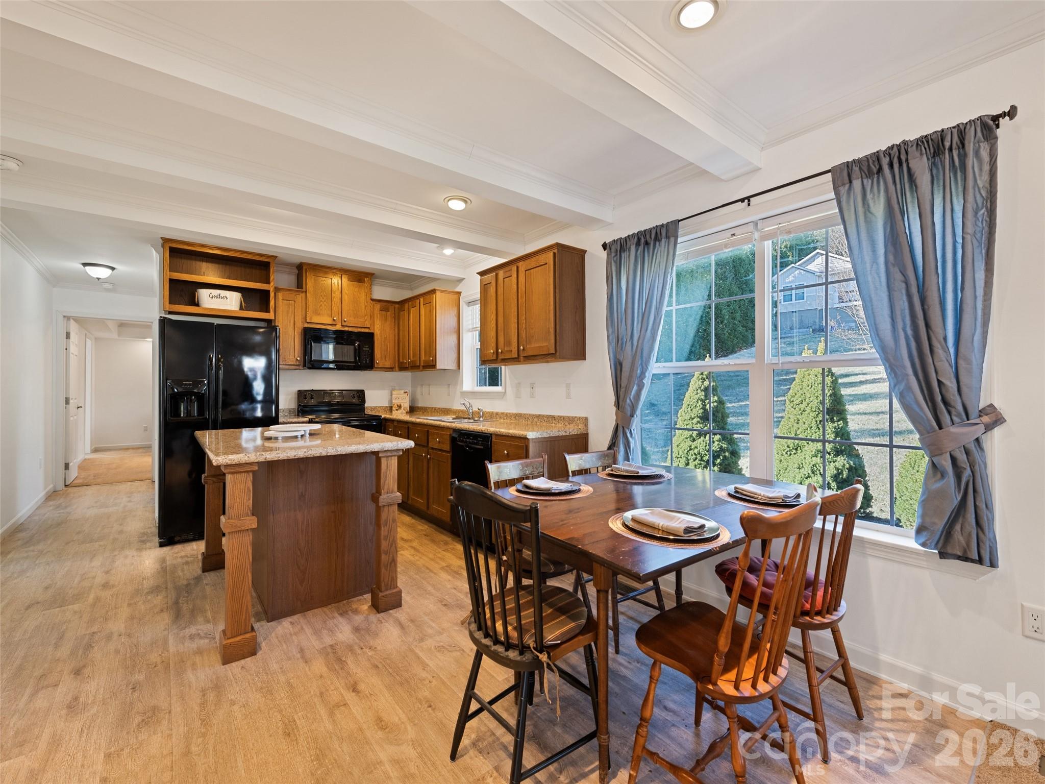 10 Enochs Way Fletcher, NC 28732 - Photo 6 of 24 a view of a dining room with furniture window and outside view