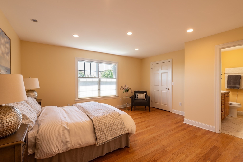 20 Bridge Road, Unit 8 Northampton, MA 01062 - Photo 18 of 32 a bedroom with a bed and a window