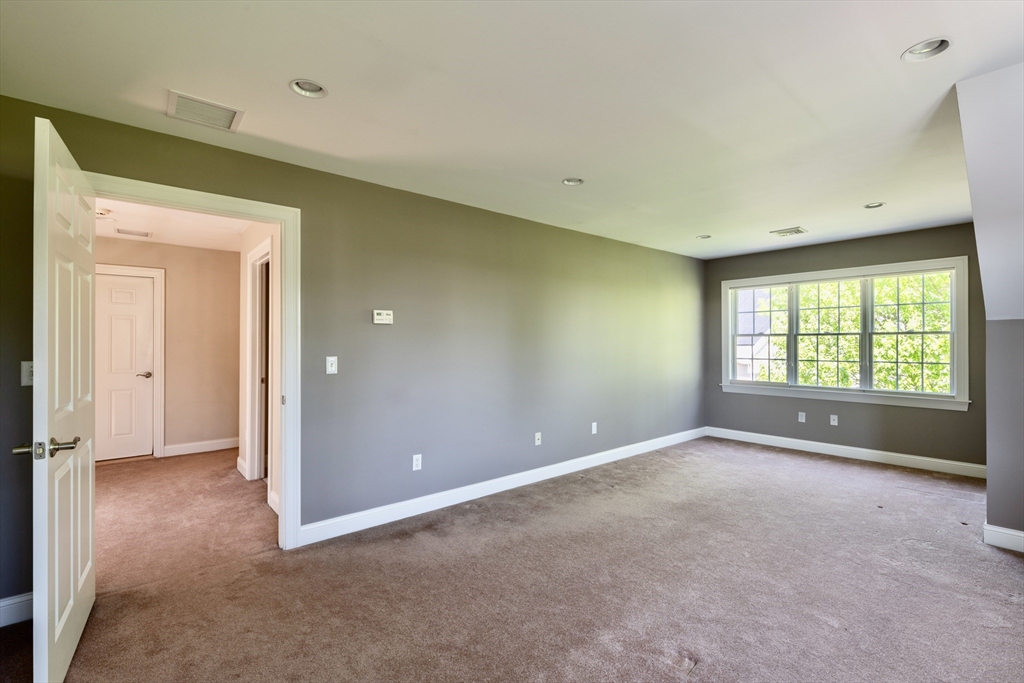 20 Bridge Road, Unit 8 Northampton, MA 01062 - Photo 24 of 32 a view of an empty room with a window