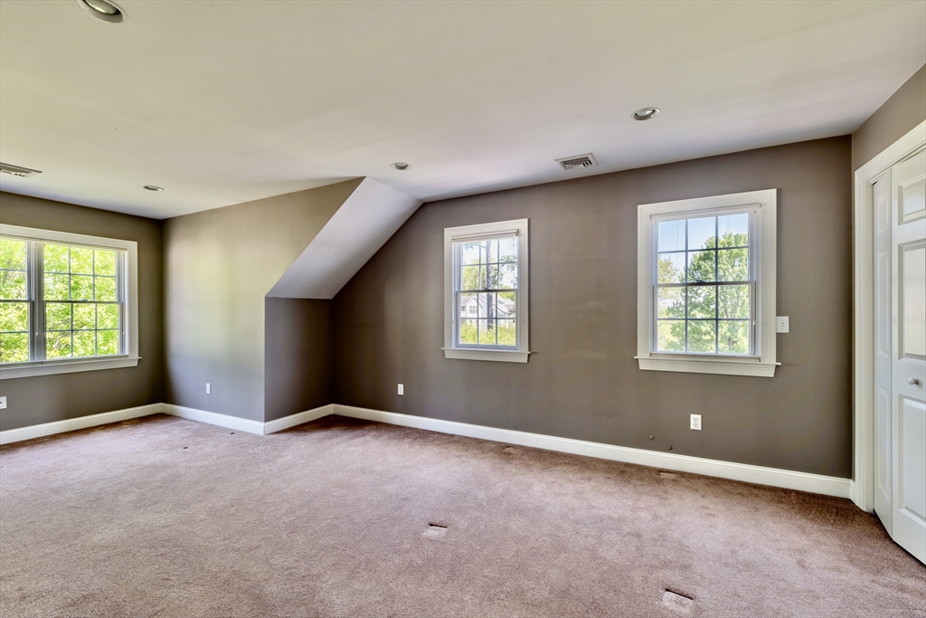 20 Bridge Road, Unit 8 Northampton, MA 01062 - Photo 25 of 32 a view of an empty room with windows