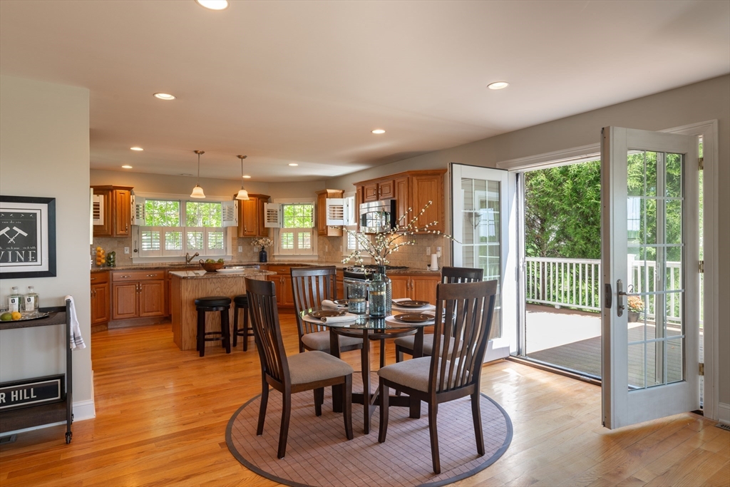 20 Bridge Road, Unit 8 Northampton, MA 01062 - Photo 9 of 32 a view of a dining room with furniture window and outside view