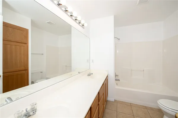 a backyard of a house with green space