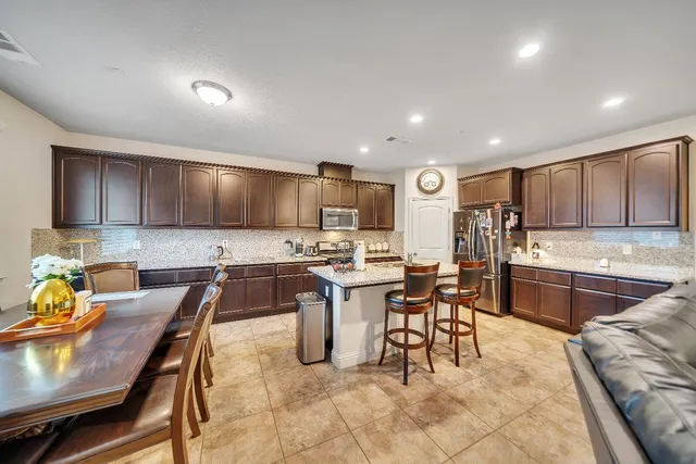 a view of a house with a sink and wooden floor