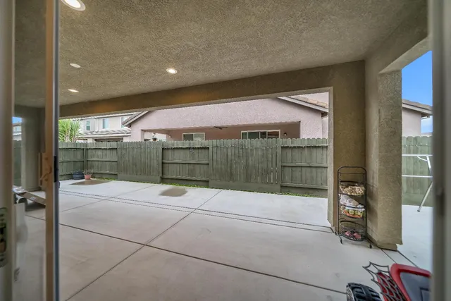 a lobby with furniture and window