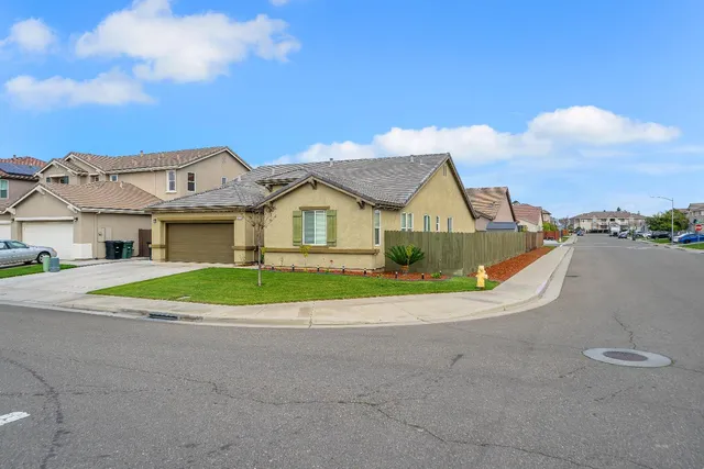 a view of house with outdoor space and street view