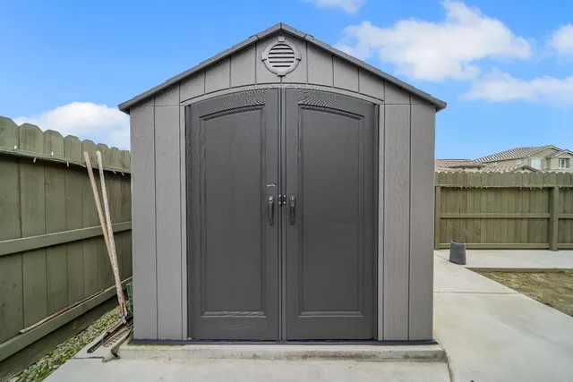 a view of a balcony with chairs