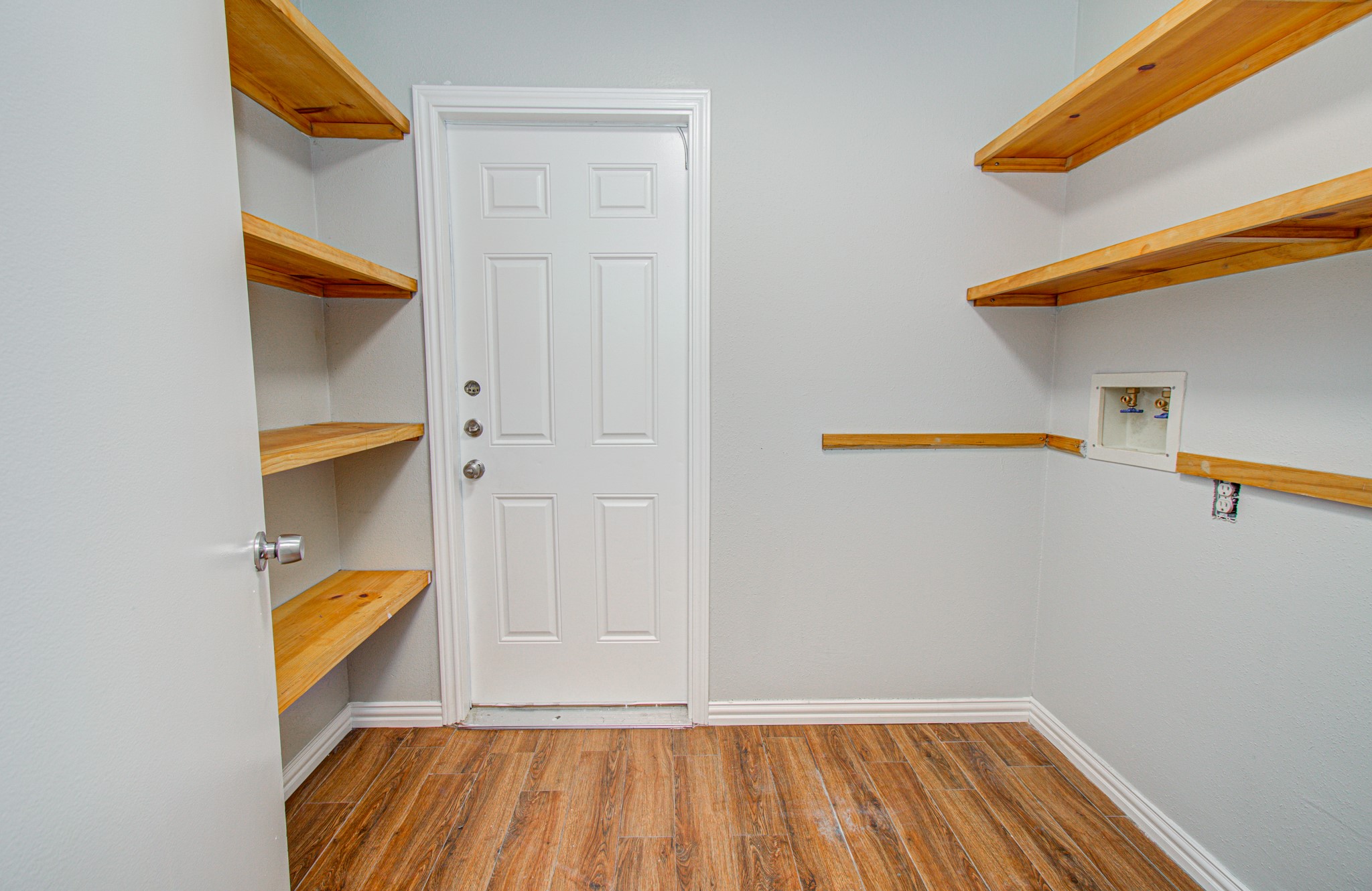 10546 Rippling Fields Drive Houston, TX 77064 - Photo 28 of 31 Utility room offers lots of storage.