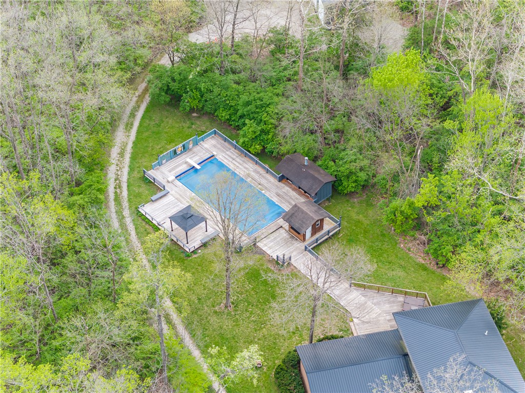 6750 Little Twin Road Germantown, OH 45327 - Photo 69 of 88 This aerial view showcases a refreshing pool and expansive deck area, perfect for outdoor enjoyment.
