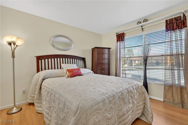 a bedroom with a bed and a closet