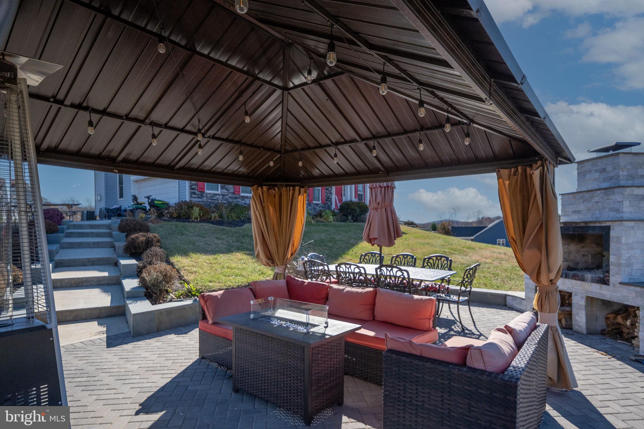 9590 Blackbird Loop Culpeper, VA 22701 - Photo 23 of 76 a outdoor space with patio lots of furniture