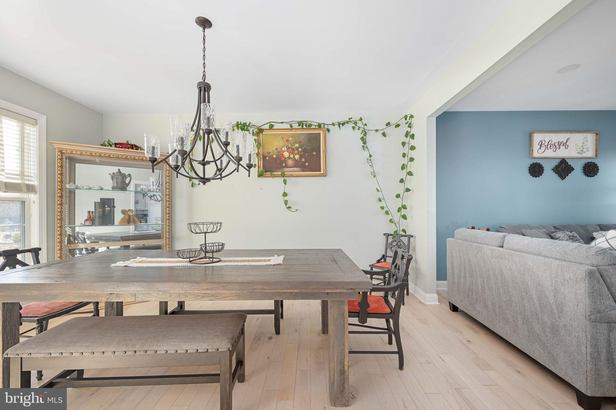 9590 Blackbird Loop Culpeper, VA 22701 - Photo 48 of 76 a room with a table and chairs