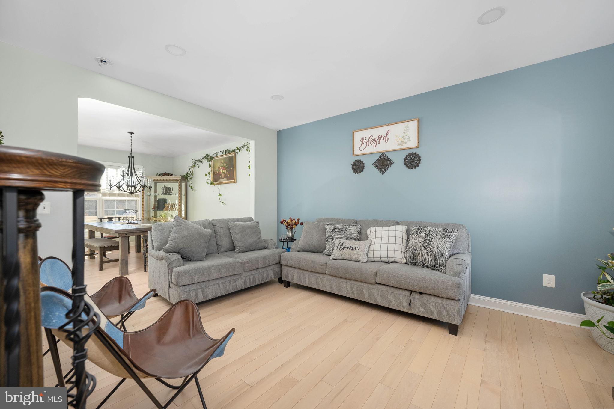 9590 Blackbird Loop Culpeper, VA 22701 - Photo 49 of 76 a living room with furniture and a flat screen tv