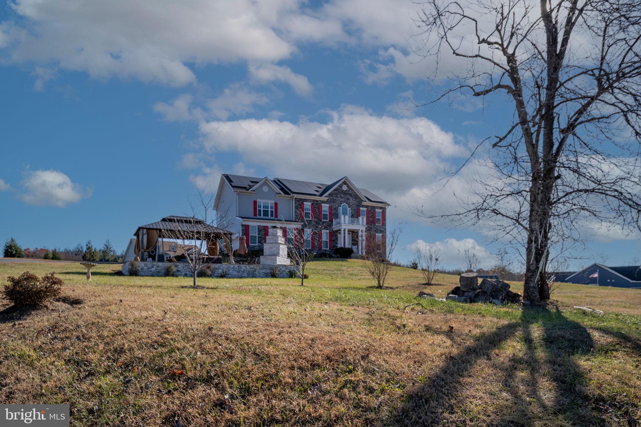 9590 Blackbird Loop Culpeper, VA 22701 - Photo 8 of 76 a view of a town with pool and trees