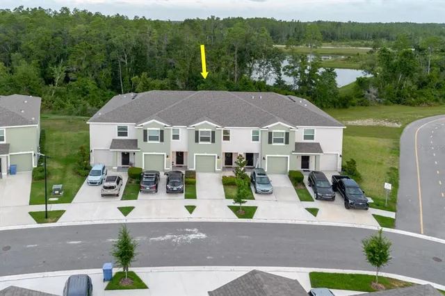 a view of house with outdoor space and sitting space