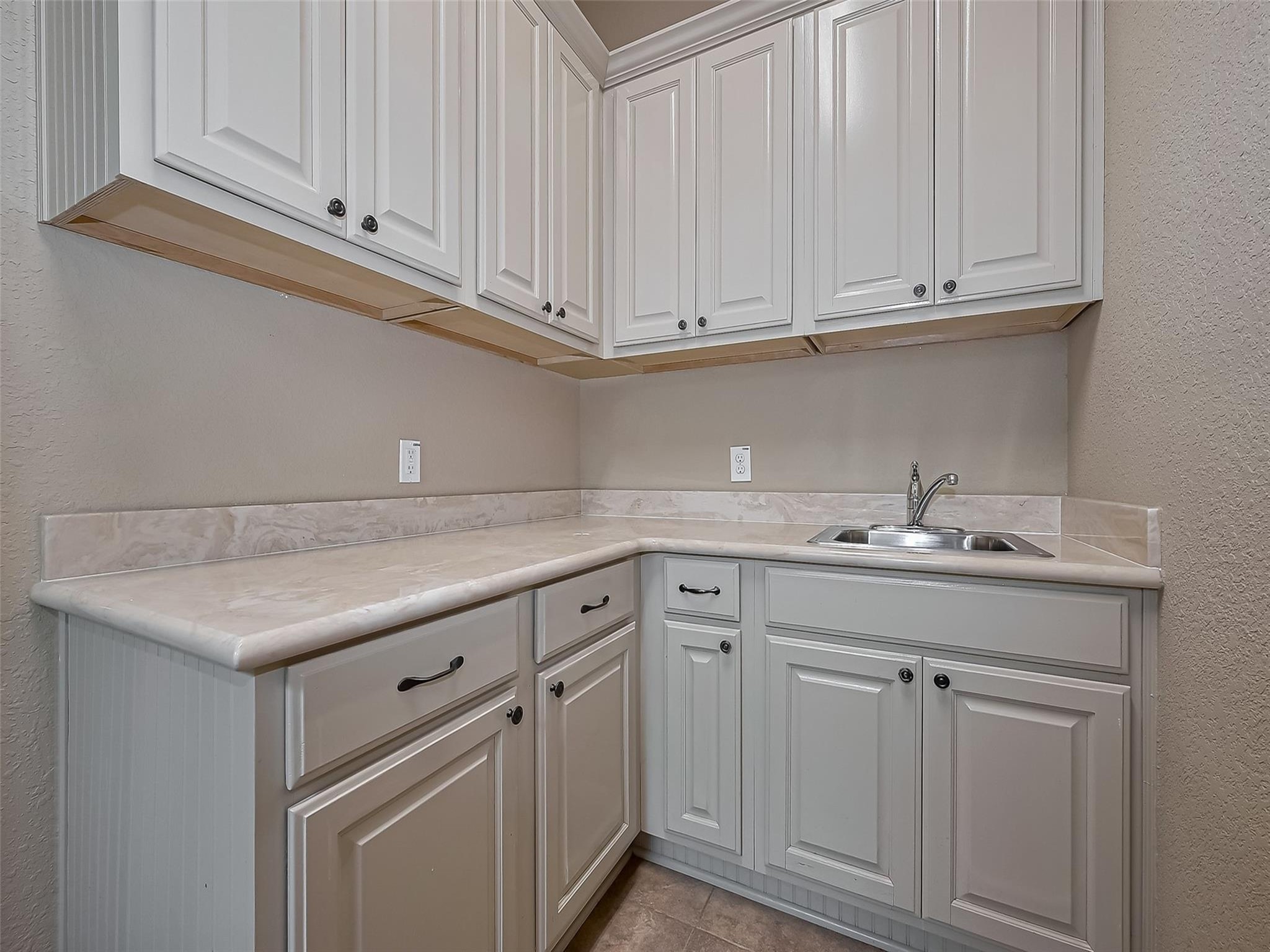 2711 King Point View Lane Spring, TX 77388 - Photo 41 of 48 Lots of cabinets and yes, it has a utility sink.