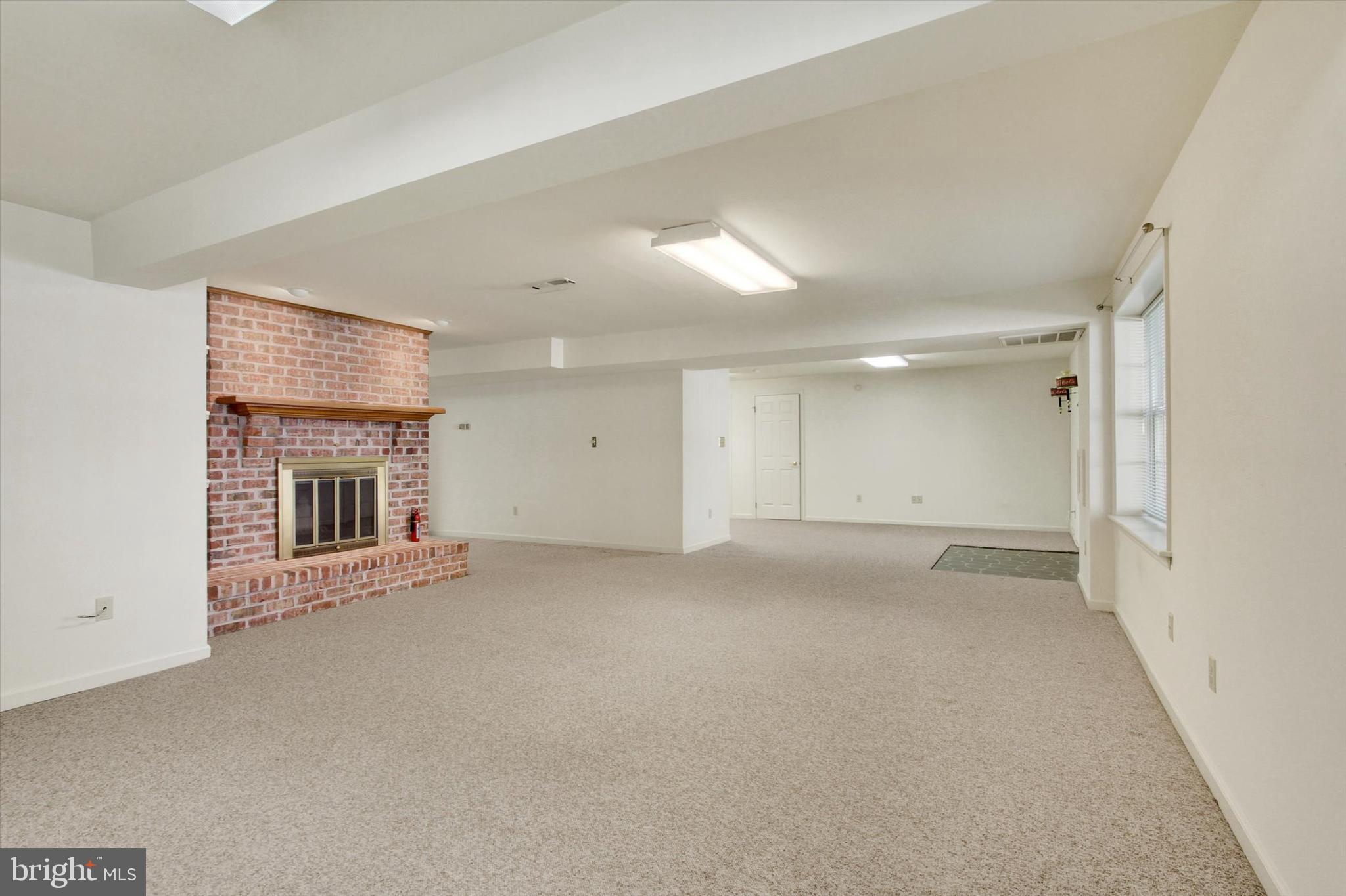 20020 Mt Aetna Road Hagerstown, MD 21742 - Photo 36 of 54 Lower-level fireplace.