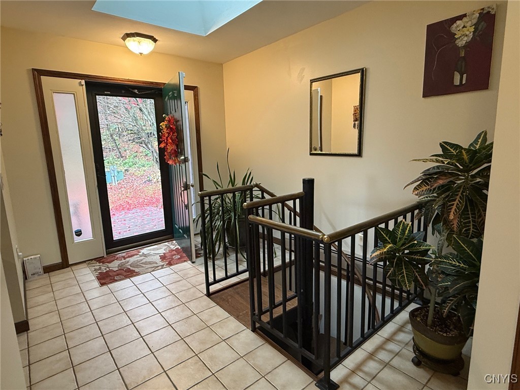 2359 Sessions Hill Road Homer, NY 13077 - Photo 17 of 50 Tiled entry way with spiral stairs to lower level