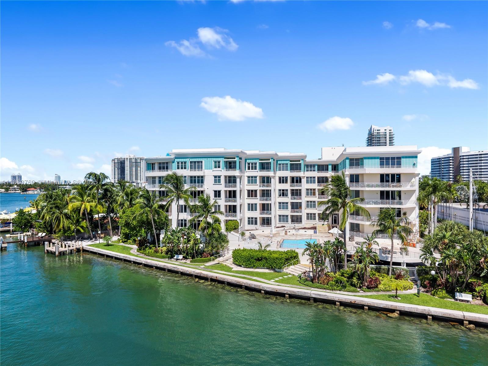 1 Century Lane, Unit 202 Miami Beach, FL 33139 - Photo 26 of 28 a house with swimming pool