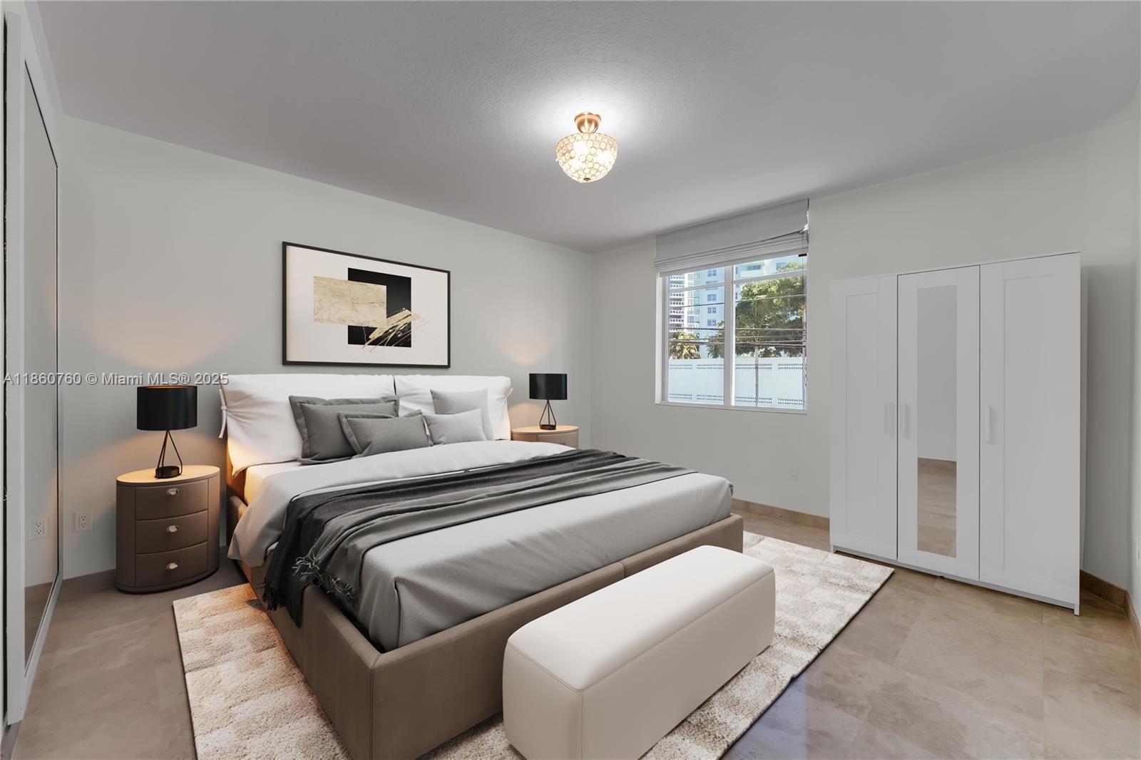 1 Century Lane, Unit 202 Miami Beach, FL 33139 - Photo 4 of 28 a bedroom with a bed and a window