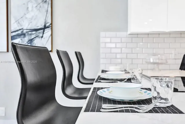 a view of a utility room with washer and dryer