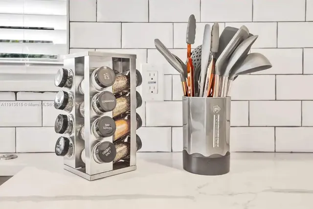 a bathroom with a sink mirror and toilet