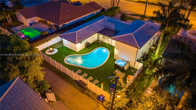 a view of a swimming pool with a patio