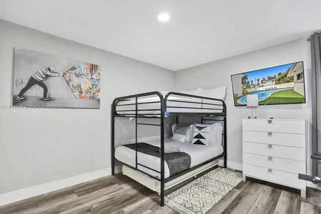 a building outdoor space with patio furniture and potted plants