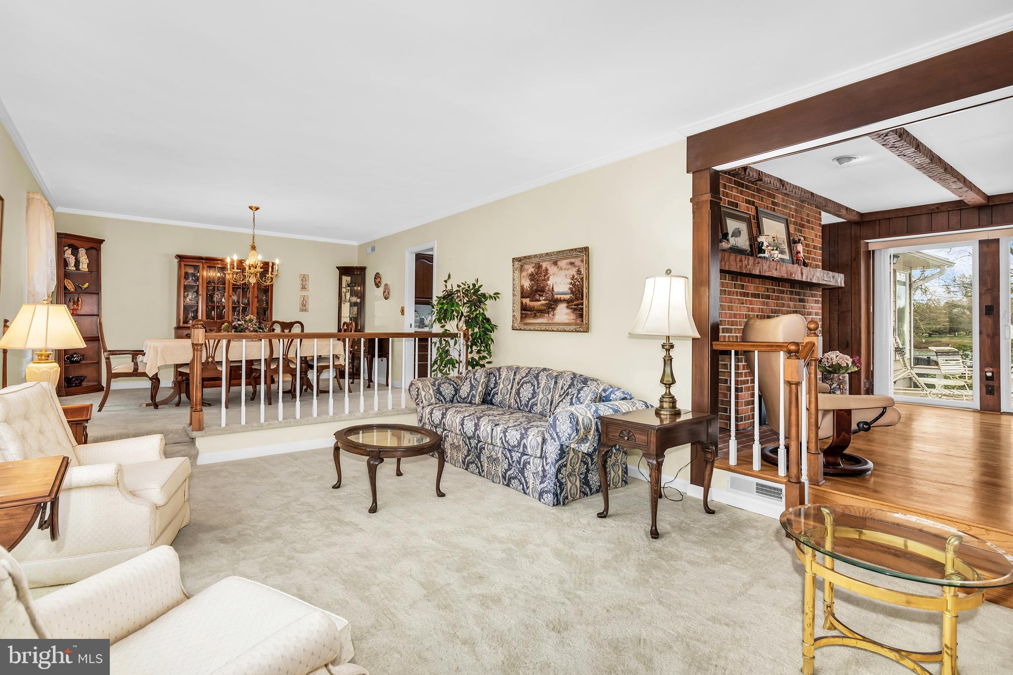 4752 Sailors Retreat Road Oxford, MD 21654 - Photo 17 of 22 a living room with furniture and a table