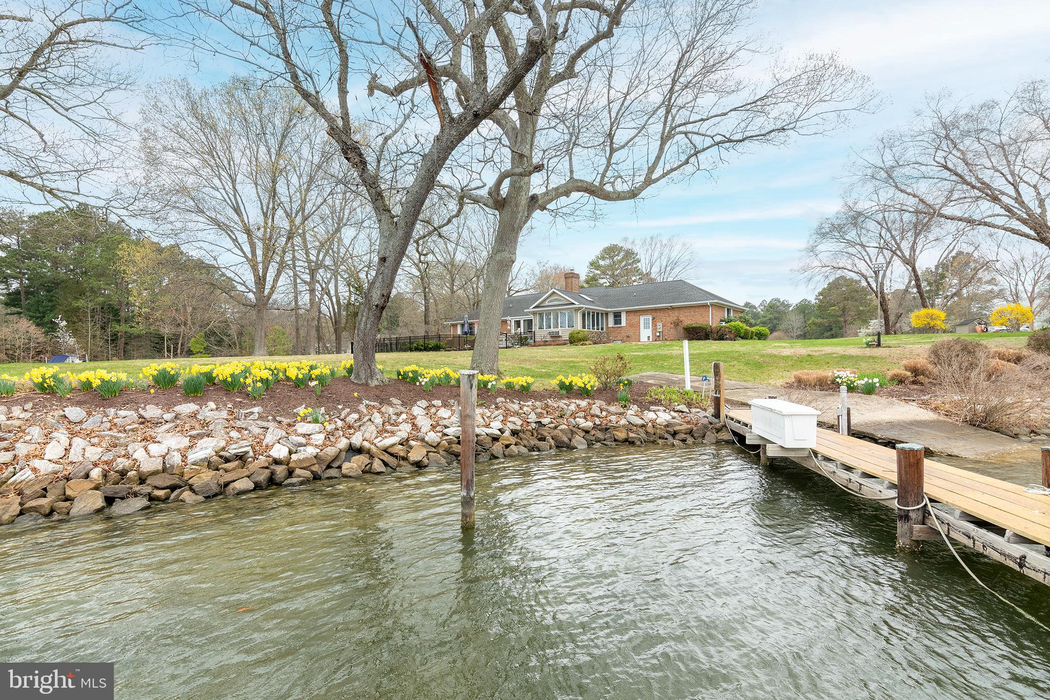 4752 Sailors Retreat Road Oxford, MD 21654 - Photo 5 of 22 a view of a lake with a big yard