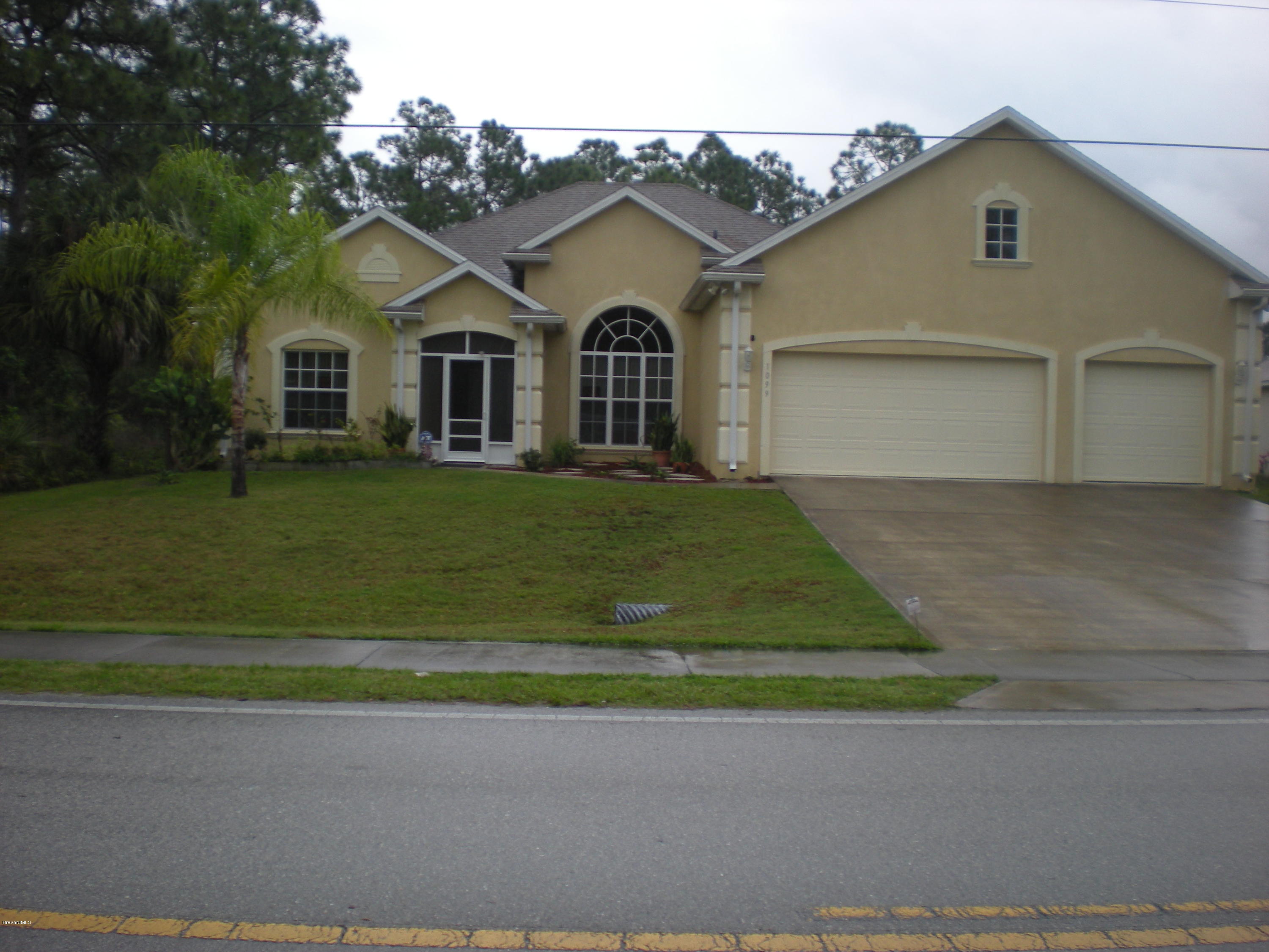 1099 Degroodt Road Southwest Palm Bay, FL 32908 - Photo 1 of 14 232 - Copy