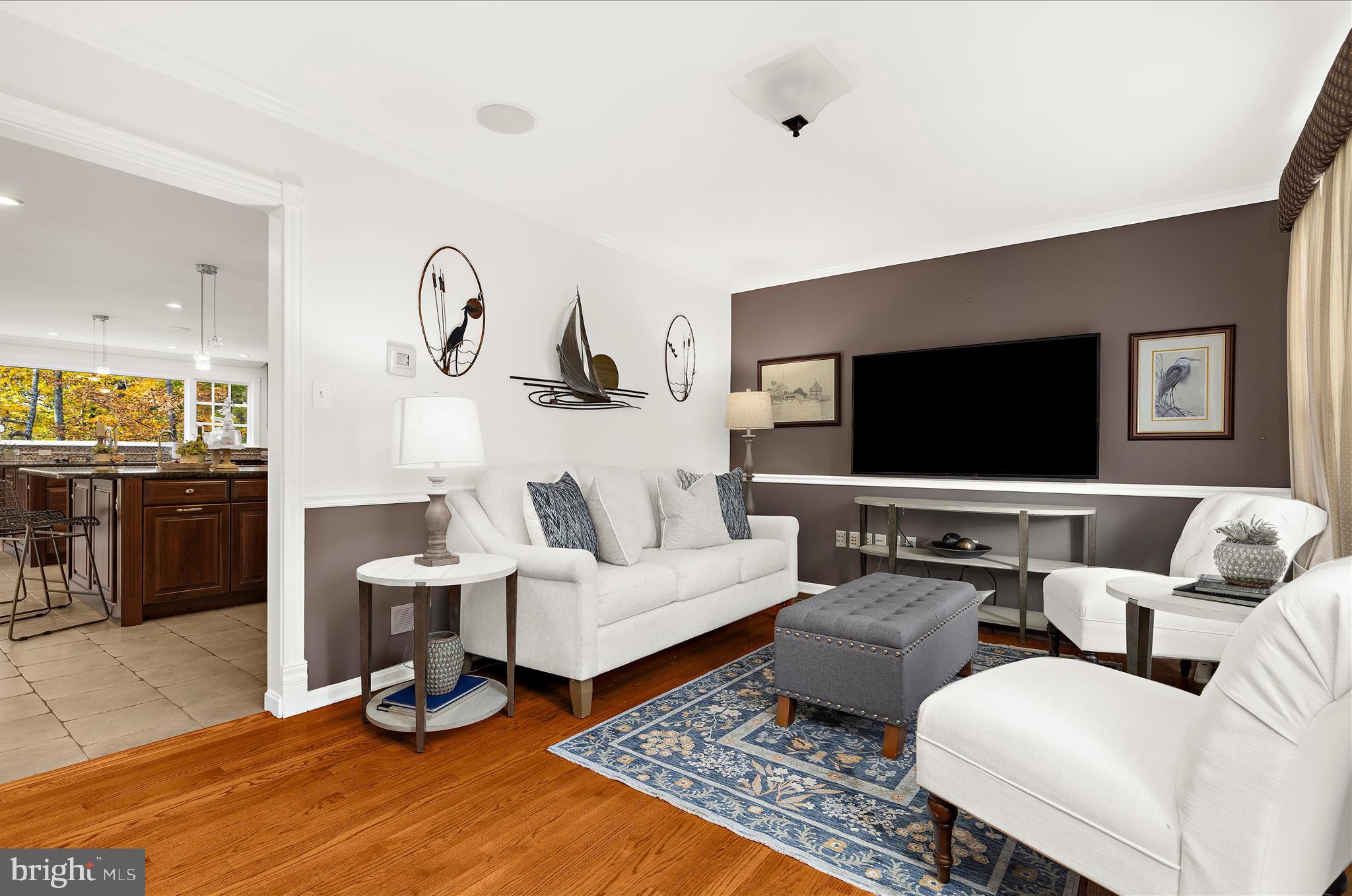 360 Hoile Lane Huntingtown, MD 20639 - Photo 11 of 96 a living room with furniture and a flat screen tv