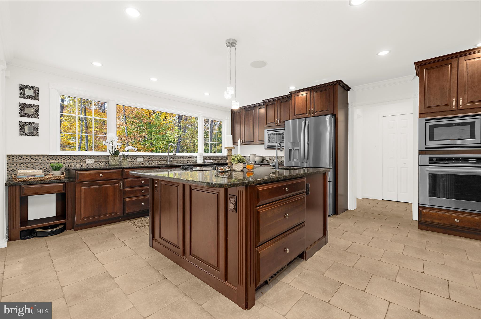 360 Hoile Lane Huntingtown, MD 20639 - Photo 16 of 96 a kitchen with stainless steel appliances granite countertop a stove refrigerator and sink