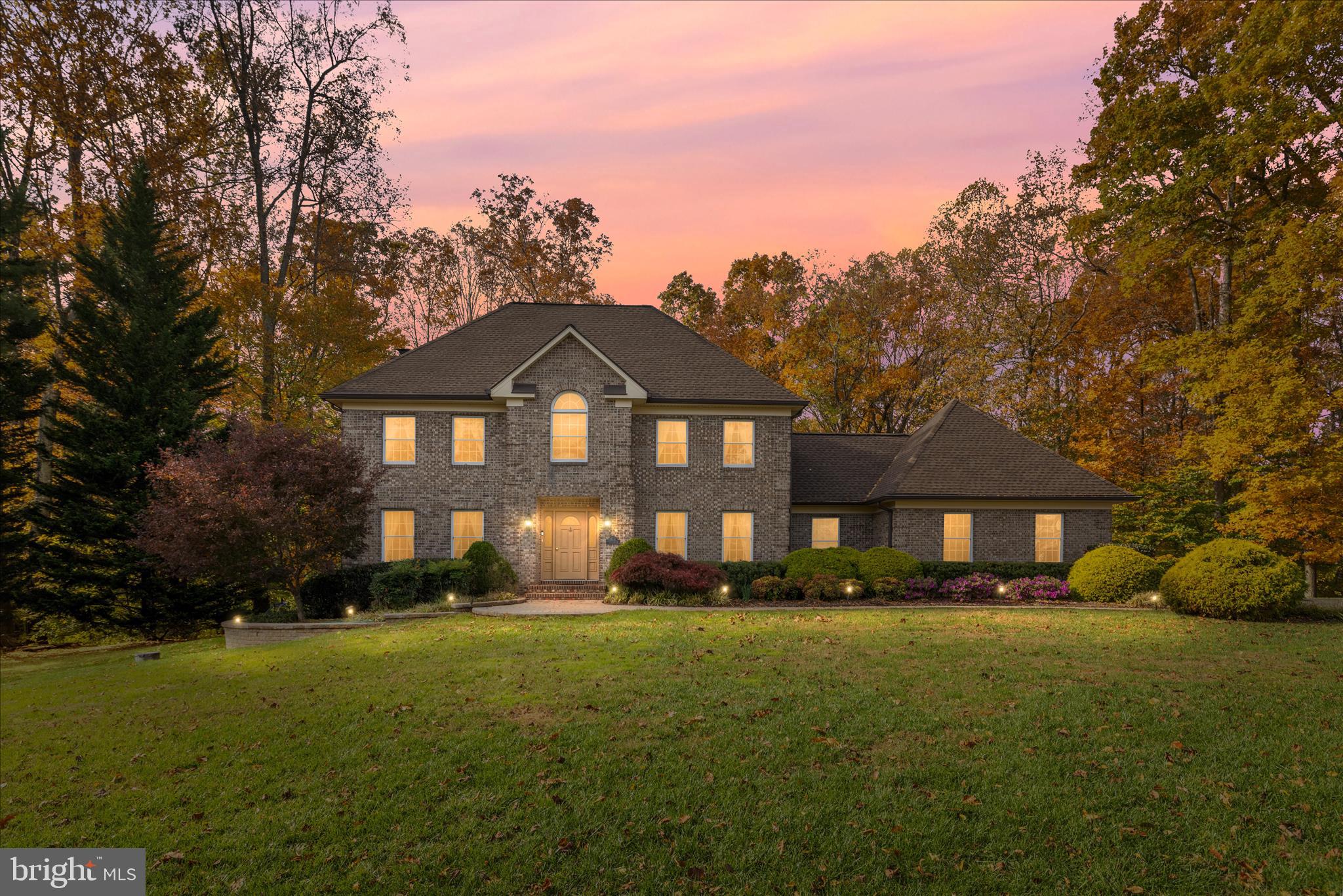 360 Hoile Lane Huntingtown, MD 20639 - Photo 2 of 96 a front view of a house with a yard