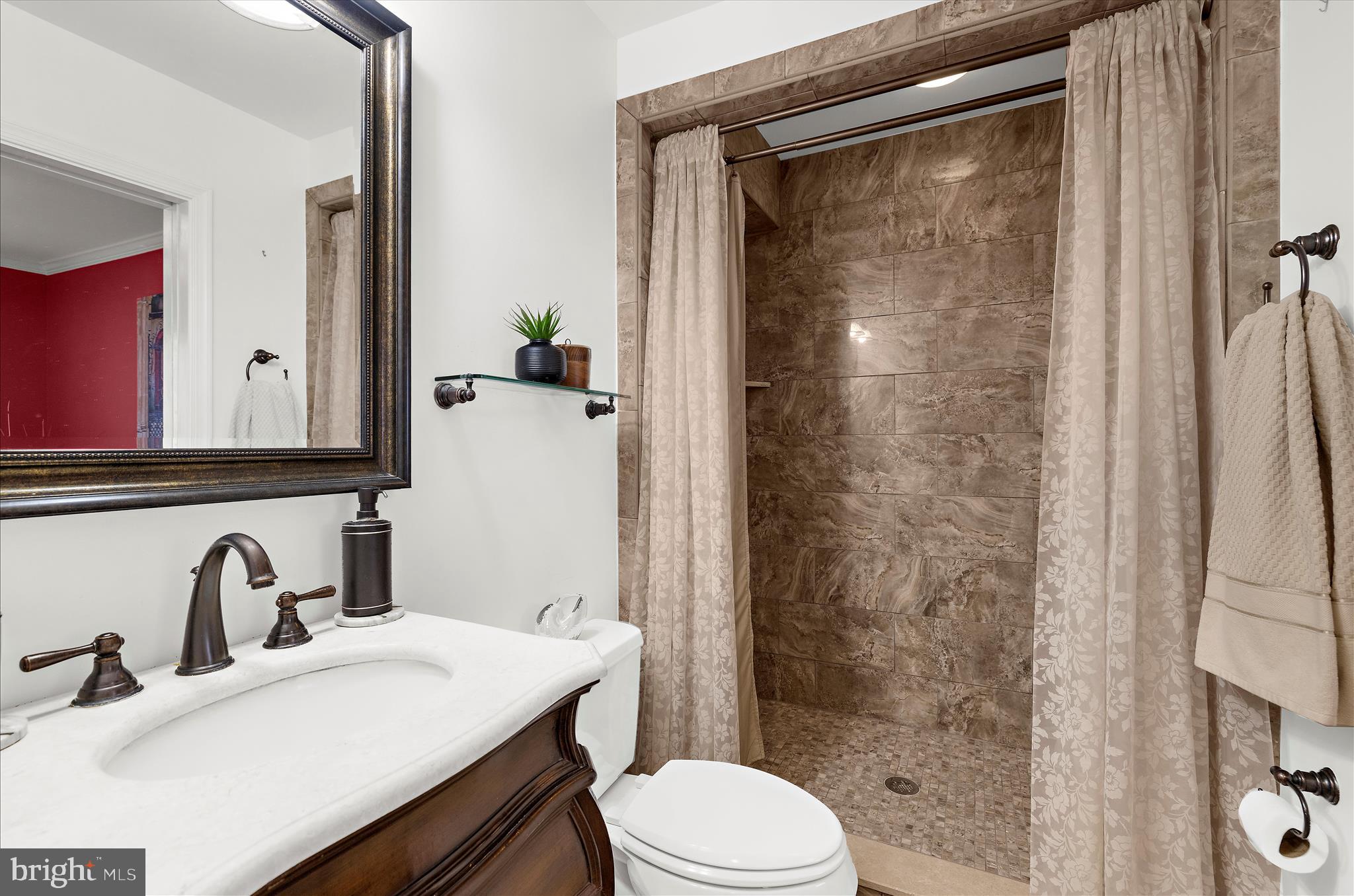 360 Hoile Lane Huntingtown, MD 20639 - Photo 36 of 96 a bathroom with a sink toilet and shower