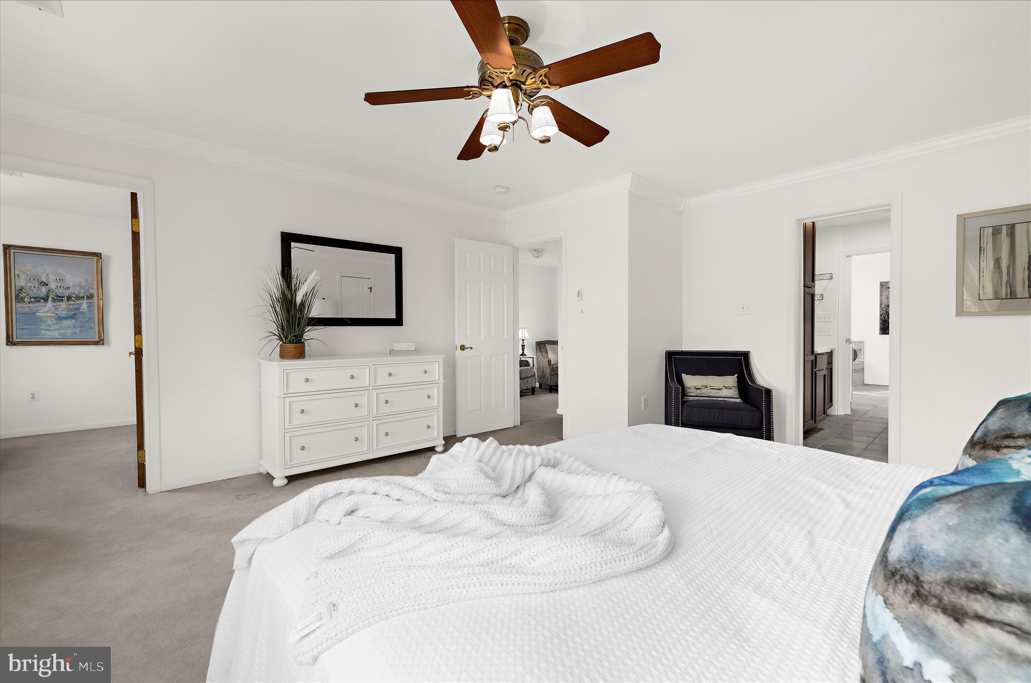 360 Hoile Lane Huntingtown, MD 20639 - Photo 38 of 96 a large bedroom with a bed and a flat tv screen