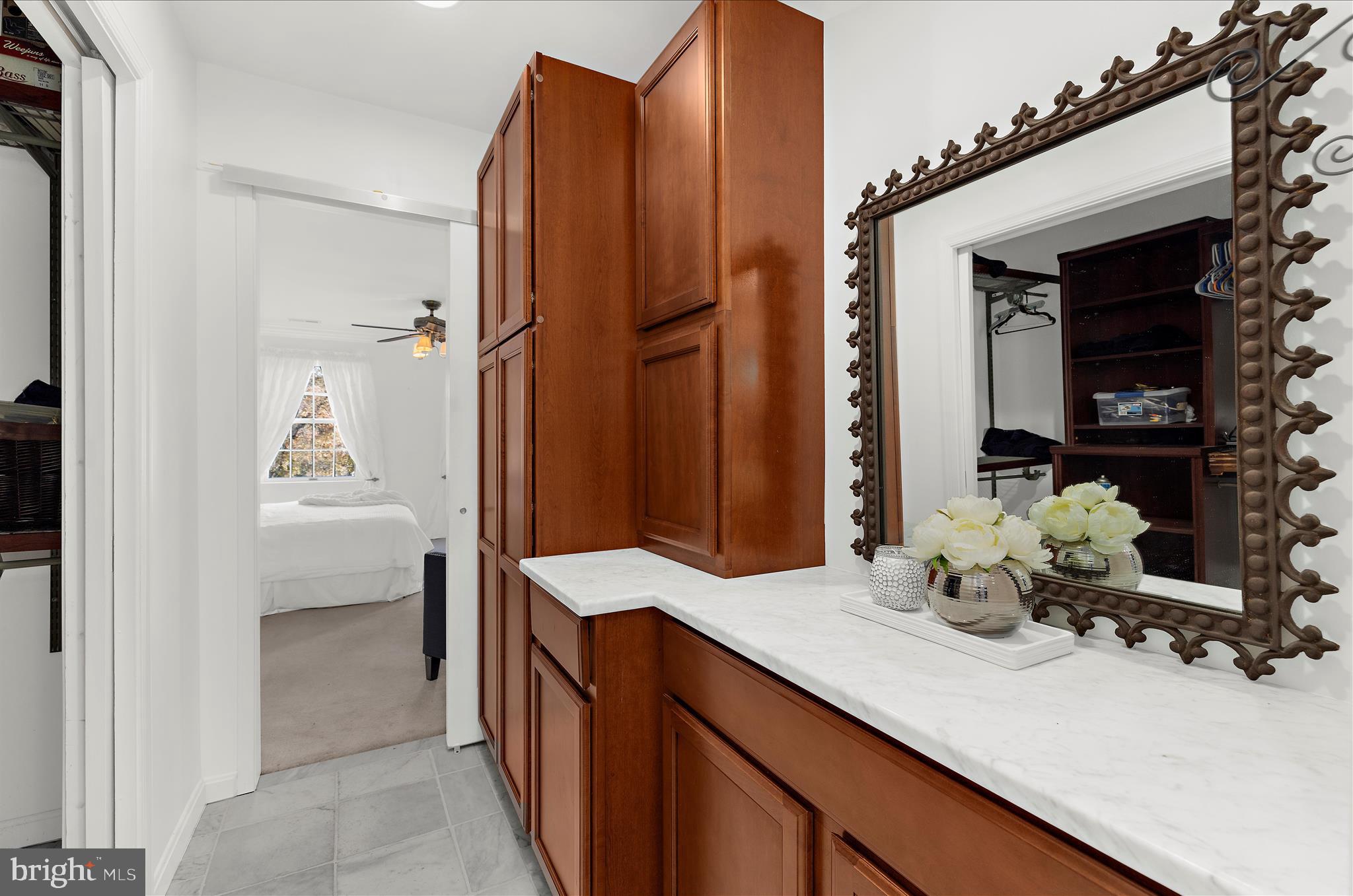 360 Hoile Lane Huntingtown, MD 20639 - Photo 44 of 96 a en suite bathroom with a sink double vanity and a mirror