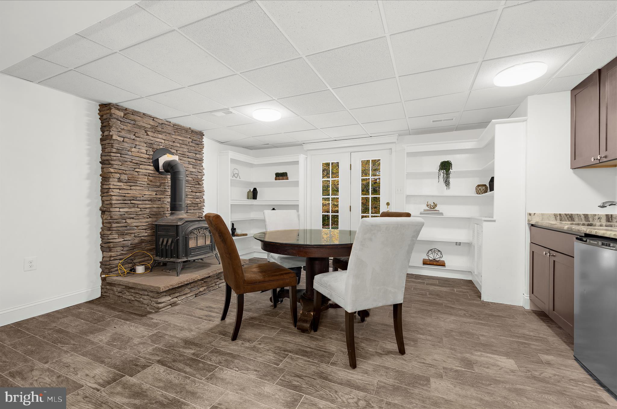 360 Hoile Lane Huntingtown, MD 20639 - Photo 58 of 96 a view of a dining room with furniture and a chandelier