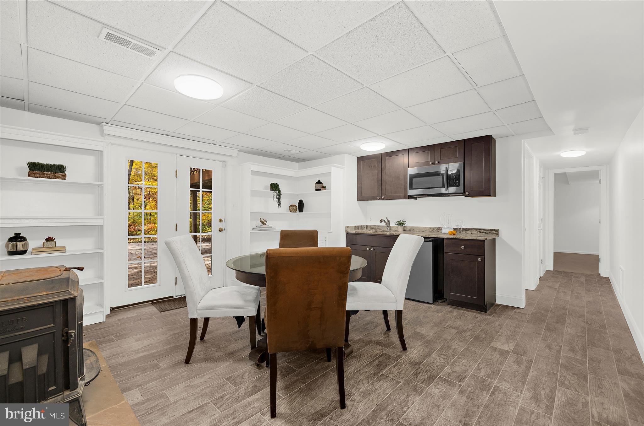 360 Hoile Lane Huntingtown, MD 20639 - Photo 61 of 96 a view of a livingroom with furniture a fireplace and wooden floor