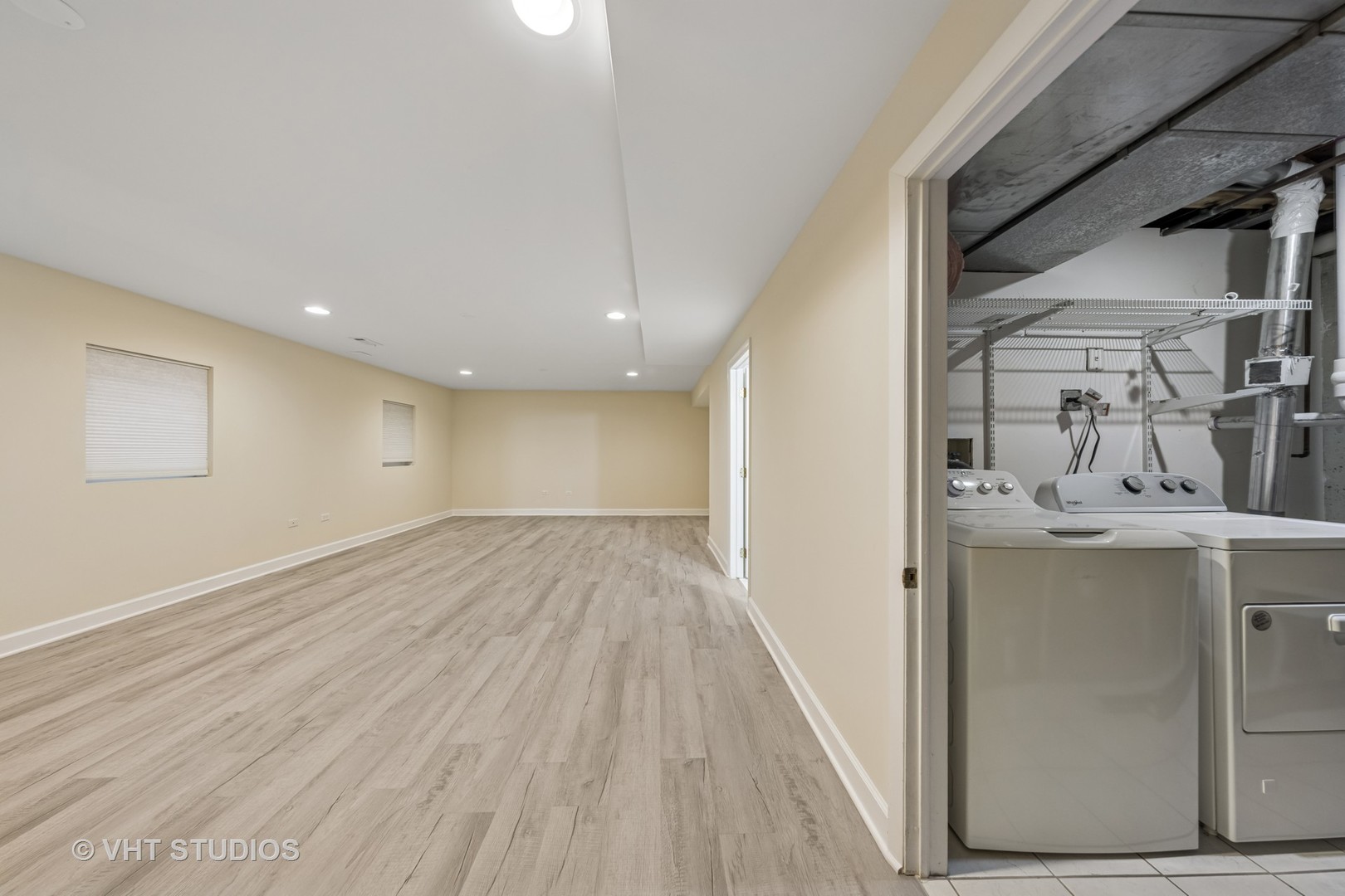 7324 Chestnut Hills Drive Burr Ridge, IL 60527 - Photo 13 of 25 a view of a hallway with wooden floor and staircase