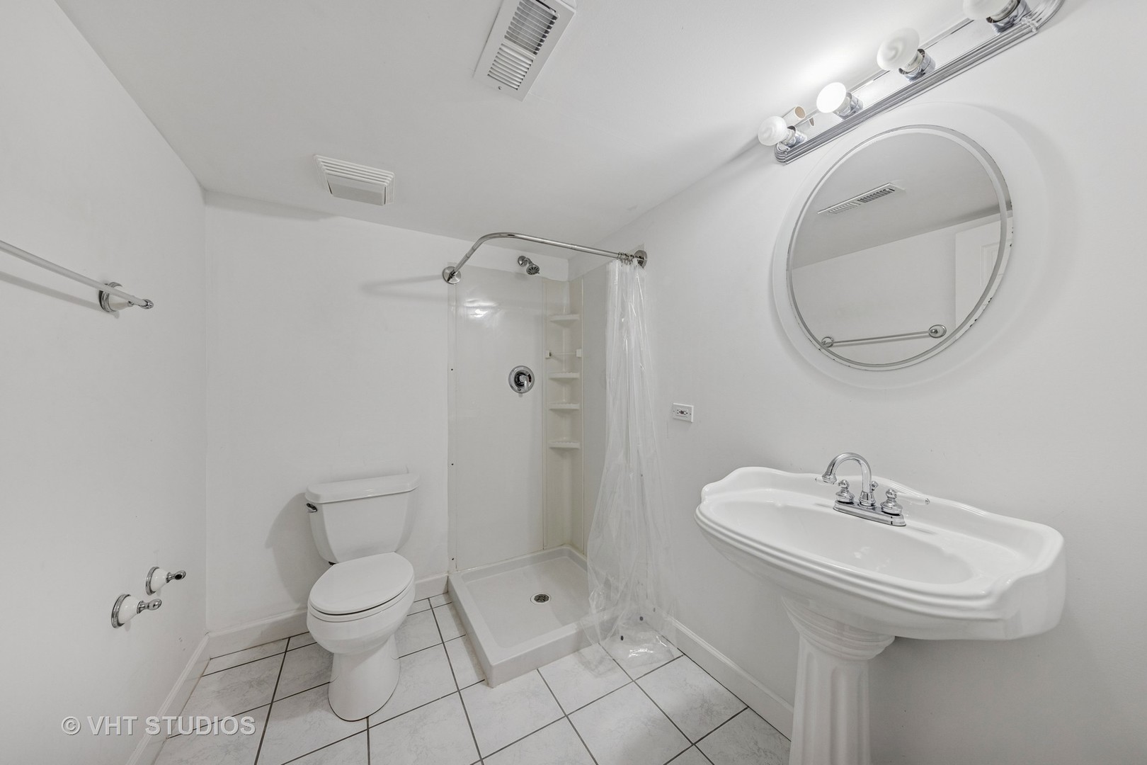 7324 Chestnut Hills Drive Burr Ridge, IL 60527 - Photo 14 of 25 a bathroom with a toilet sink and shower