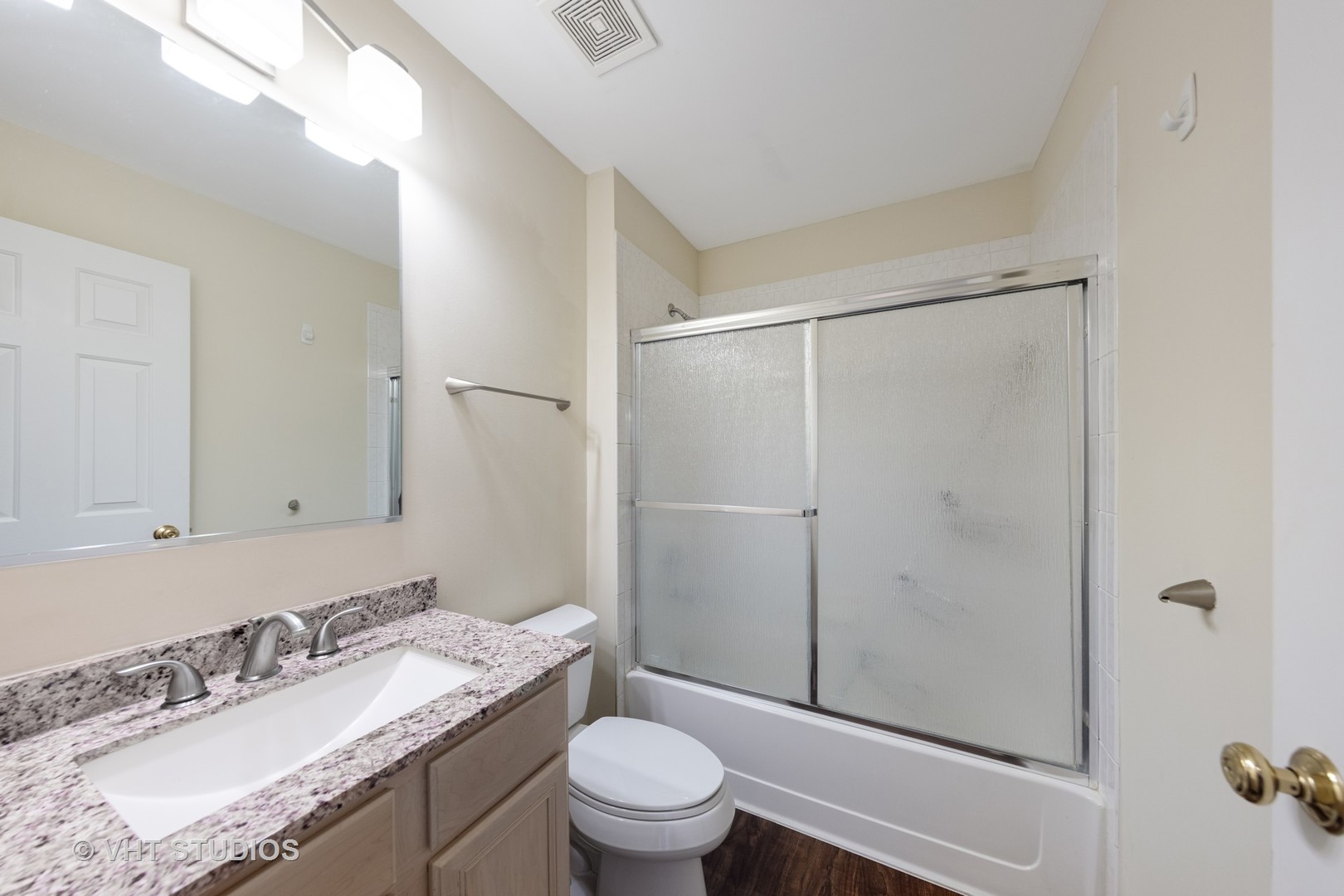 7324 Chestnut Hills Drive Burr Ridge, IL 60527 - Photo 16 of 25 a bathroom with a granite countertop sink toilet and shower