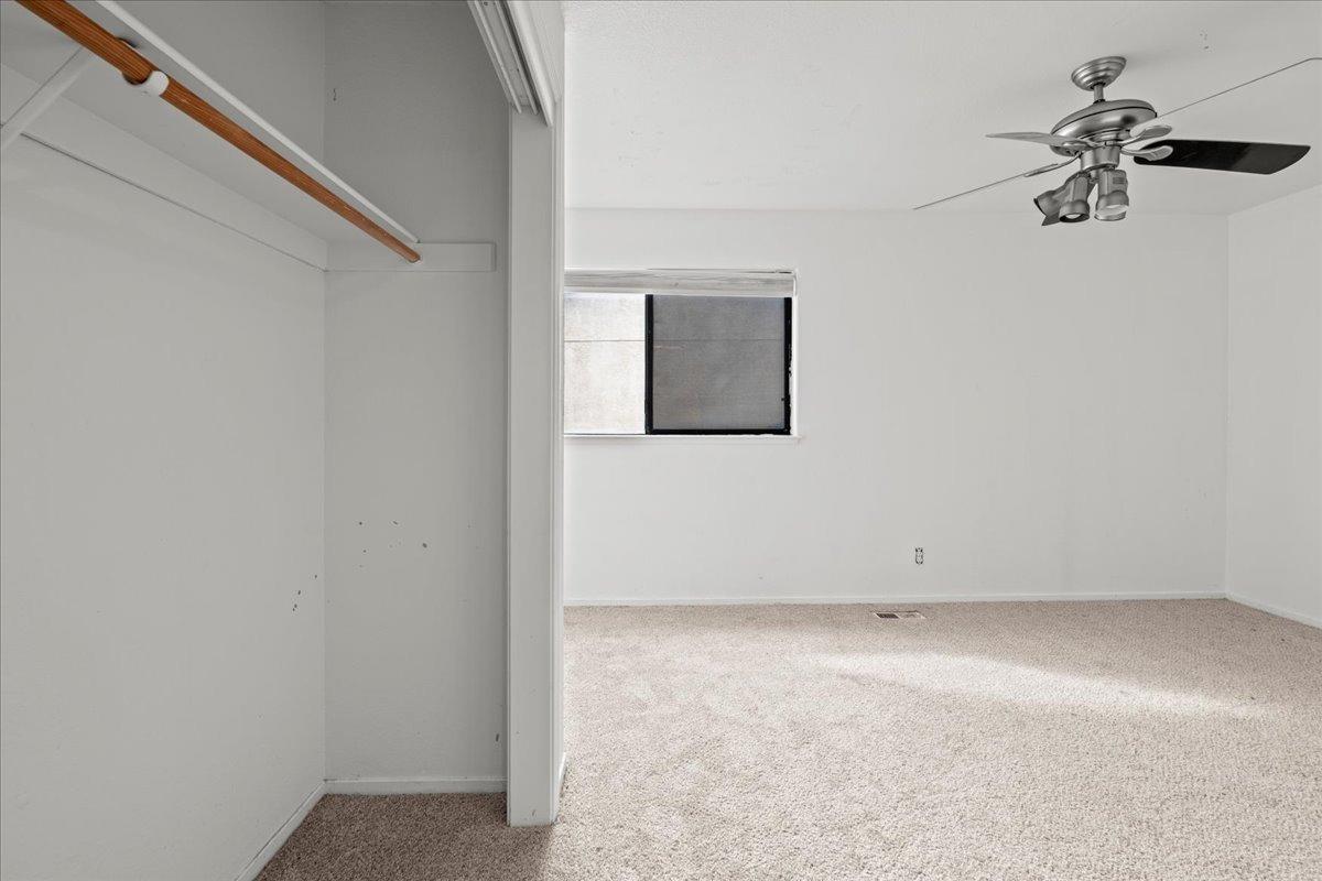 938 Snowgoose Lane Manteca, CA 95337 - Photo 14 of 16 an empty room with a window