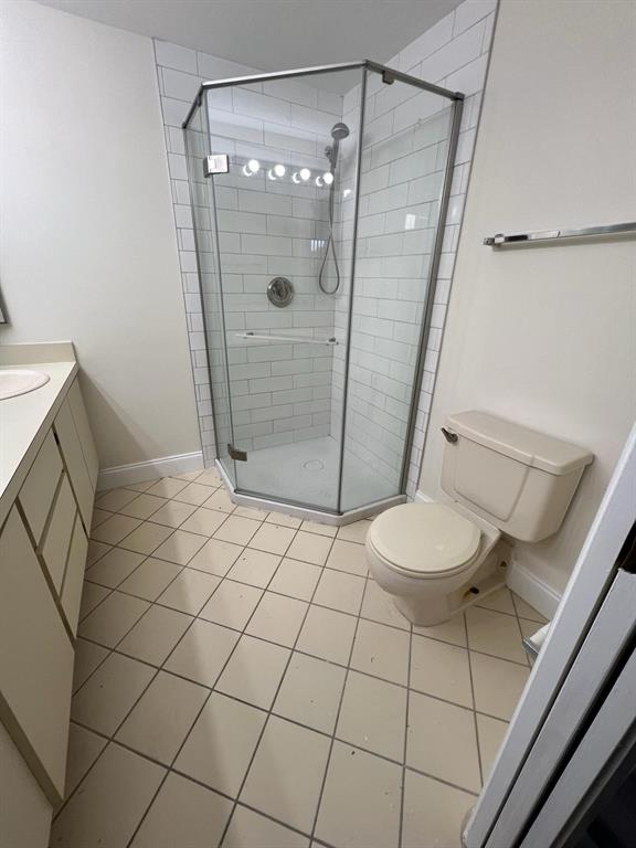 849 Blue Ridge Circle West Palm Beach, FL 33409 - Photo 18 of 28 a bathroom with a shower and a toilet