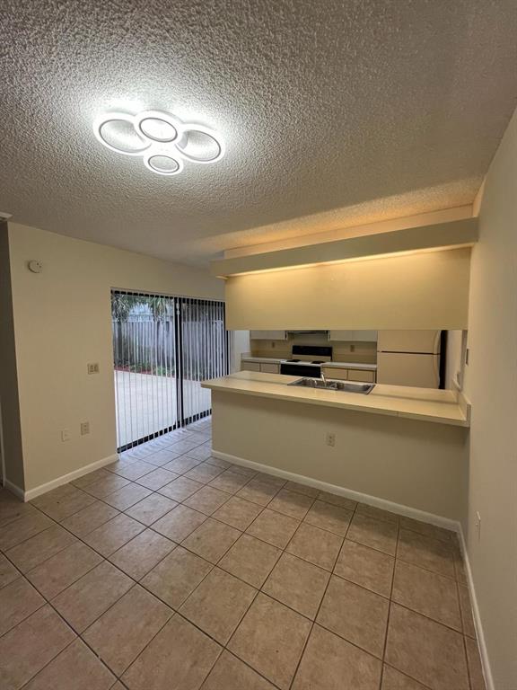849 Blue Ridge Circle West Palm Beach, FL 33409 - Photo 25 of 28 a view of kitchen with windows