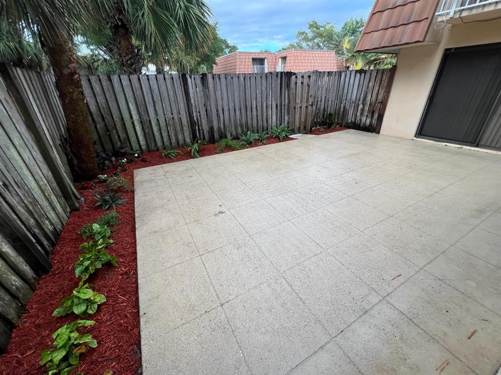 849 Blue Ridge Circle West Palm Beach, FL 33409 - Photo 26 of 28 a view of a backyard