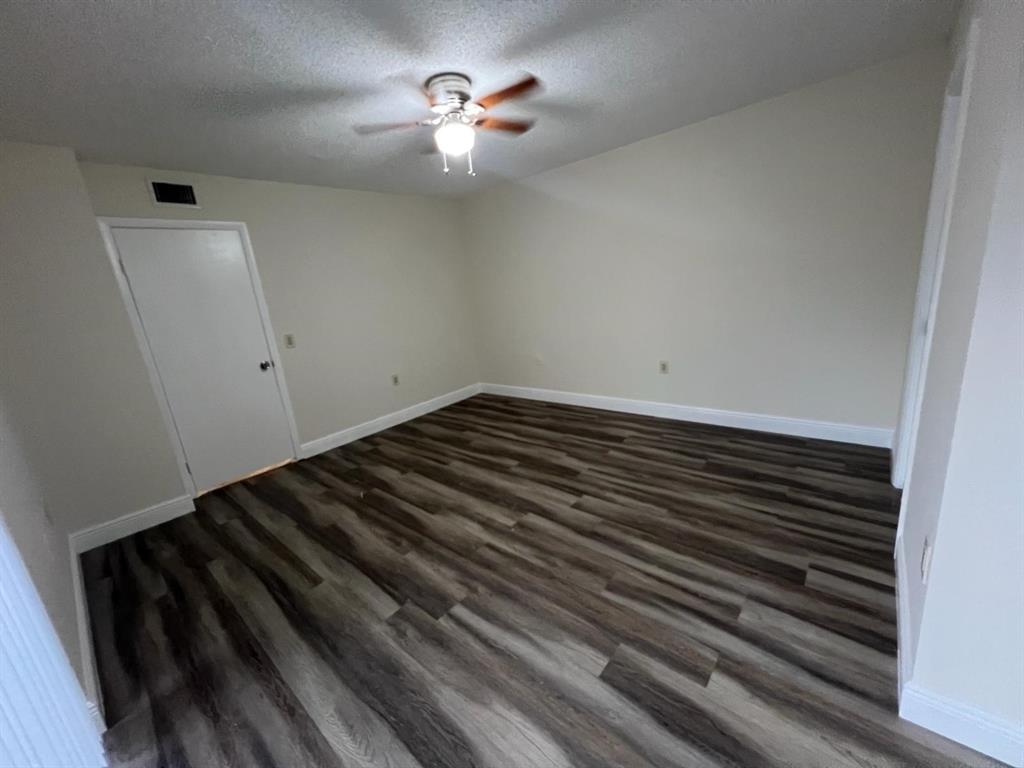849 Blue Ridge Circle West Palm Beach, FL 33409 - Photo 28 of 28 a view of room with a fan
