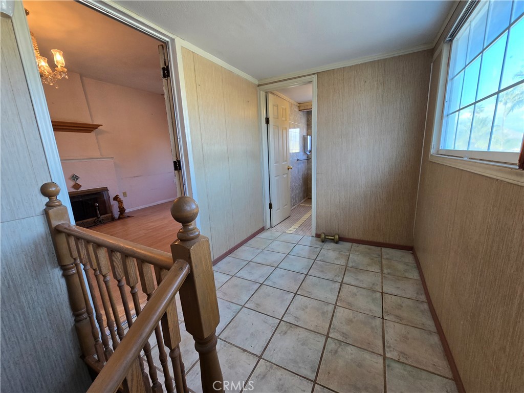 2789 Fairmount Boulevard Riverside, CA 92501 - Photo 15 of 74 a view of entryway with a window and wooden floor