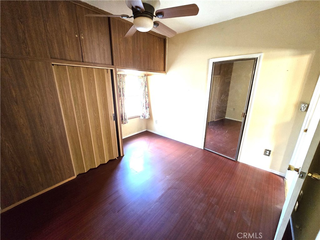 2789 Fairmount Boulevard Riverside, CA 92501 - Photo 34 of 74 wooden floor in an empty room with a window